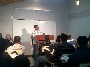 Tony Campos leading chapel service last April at Pastors Training Center.